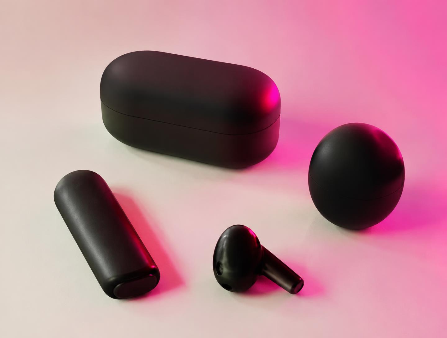 Matte black consumer tech objects lit with hot pink gel lighting